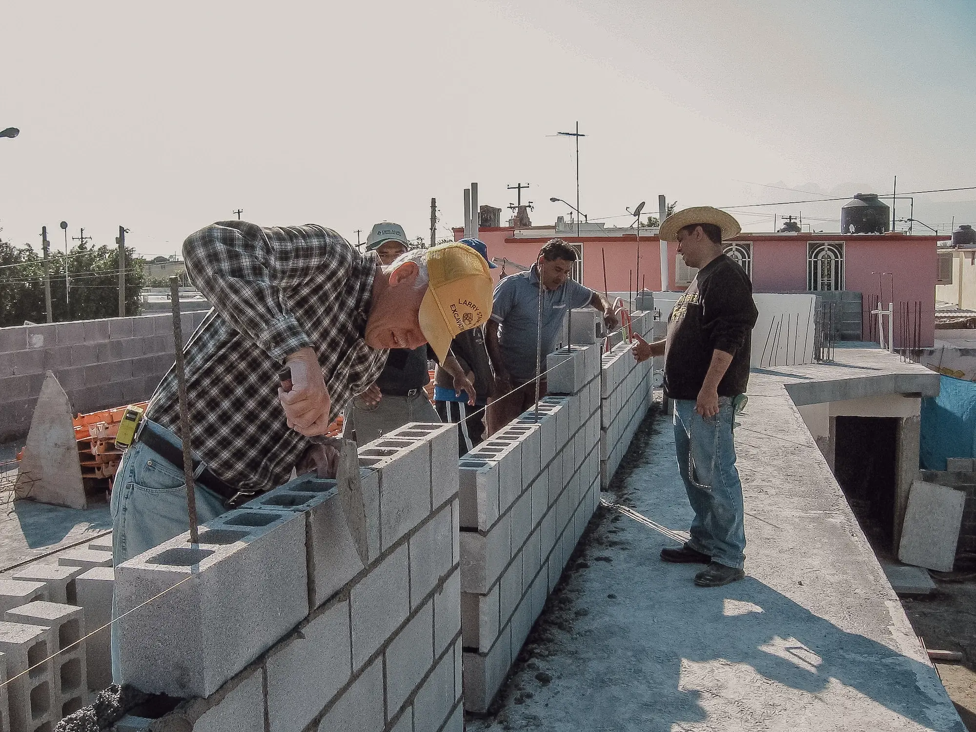 IMG_0344-2100 People building a masonry wall